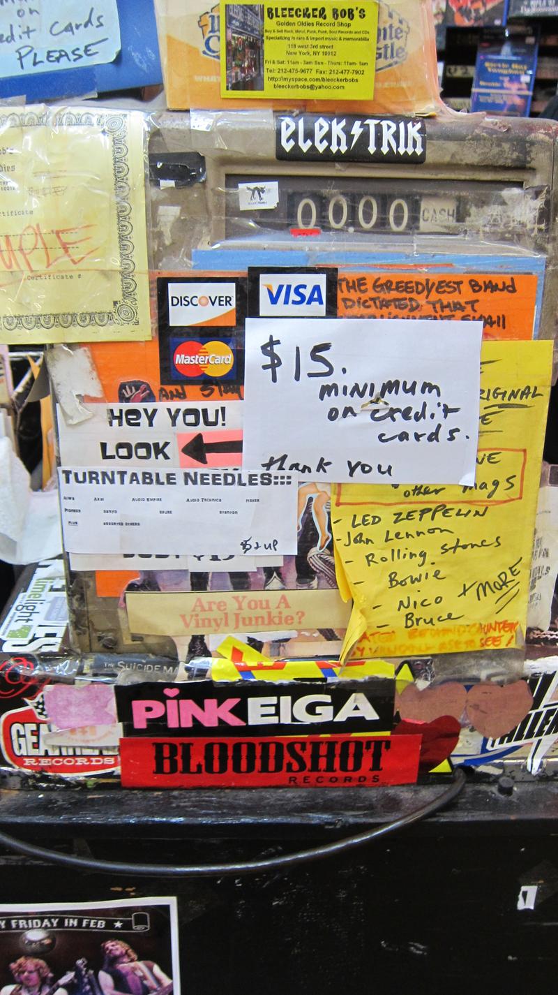 Stickers cover the cash register at Bleeker Bob's.